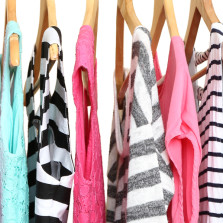 Shirts on hangers hanging on a rack