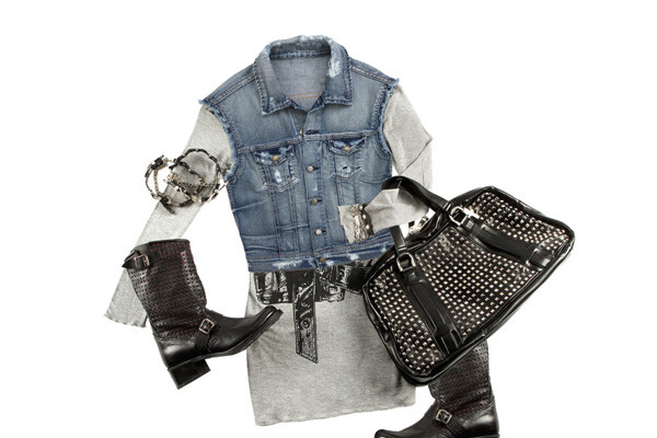 Distressed jean jacket, grey skirt, black belt, black boots, and black purse
