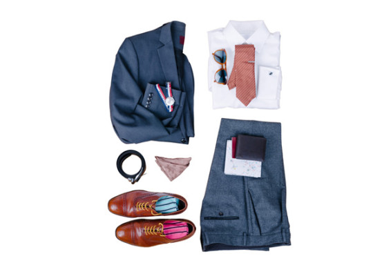 Blue suit jacket, white button up shirt, coral colored tie, blue dress pants, brown dress shoes, belt and accessories