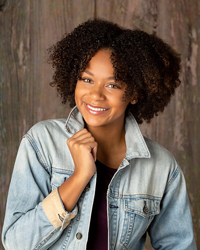 A girl wearing a jean jacket